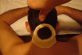 Manyabasti Ayurvedic therapy - herbal oil treatment for upper back and shoulders