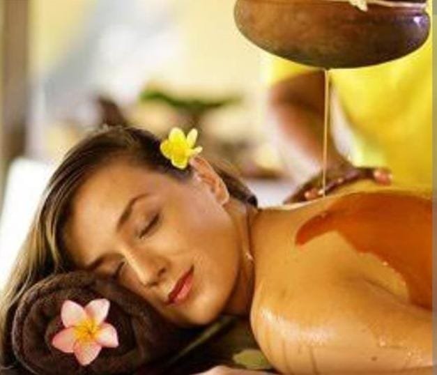 Manyadhara Ayurvedic therapy - medicated oil pouring for back and neck pain